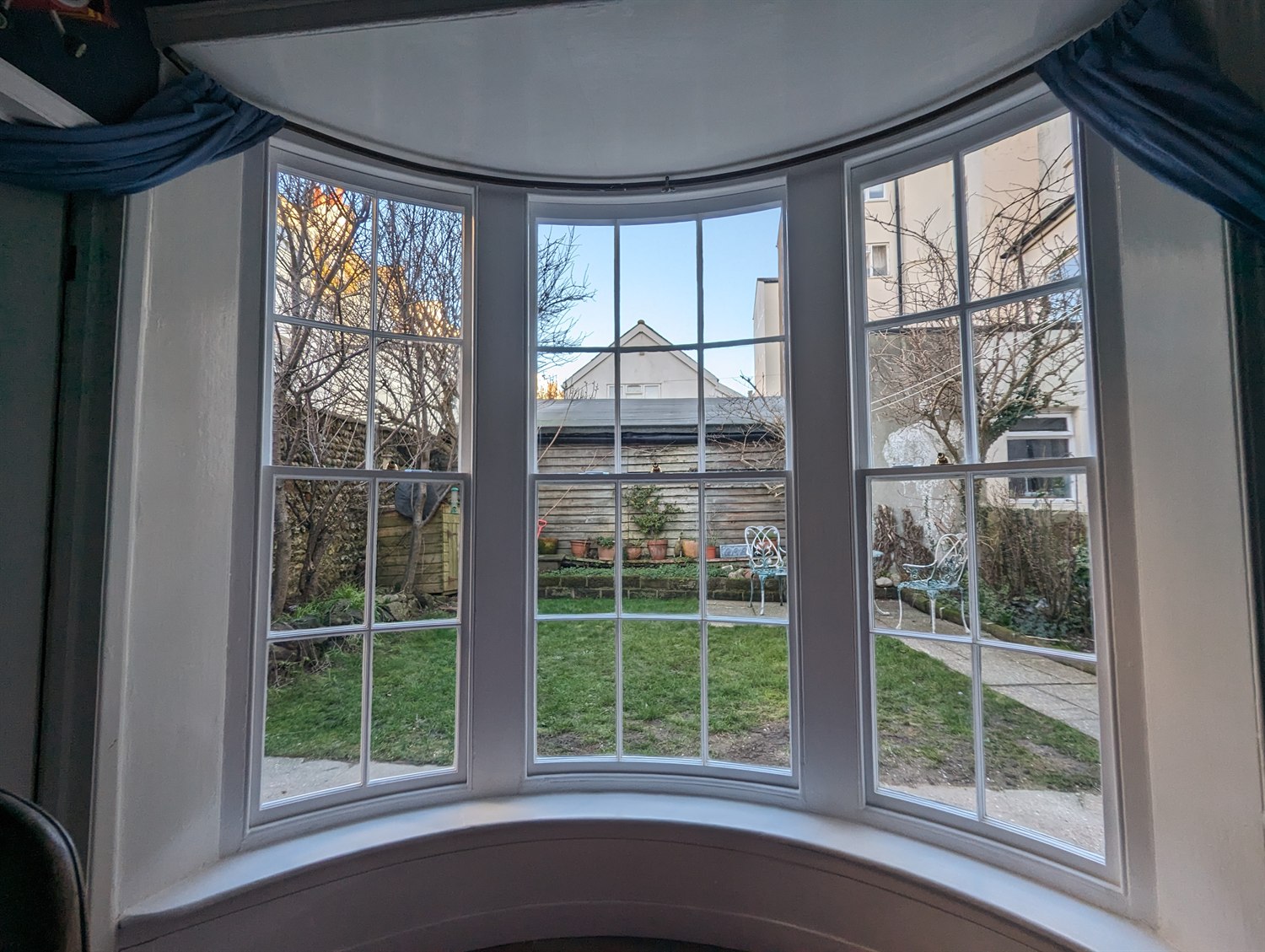 Finished restored bay sash window from inside a period home